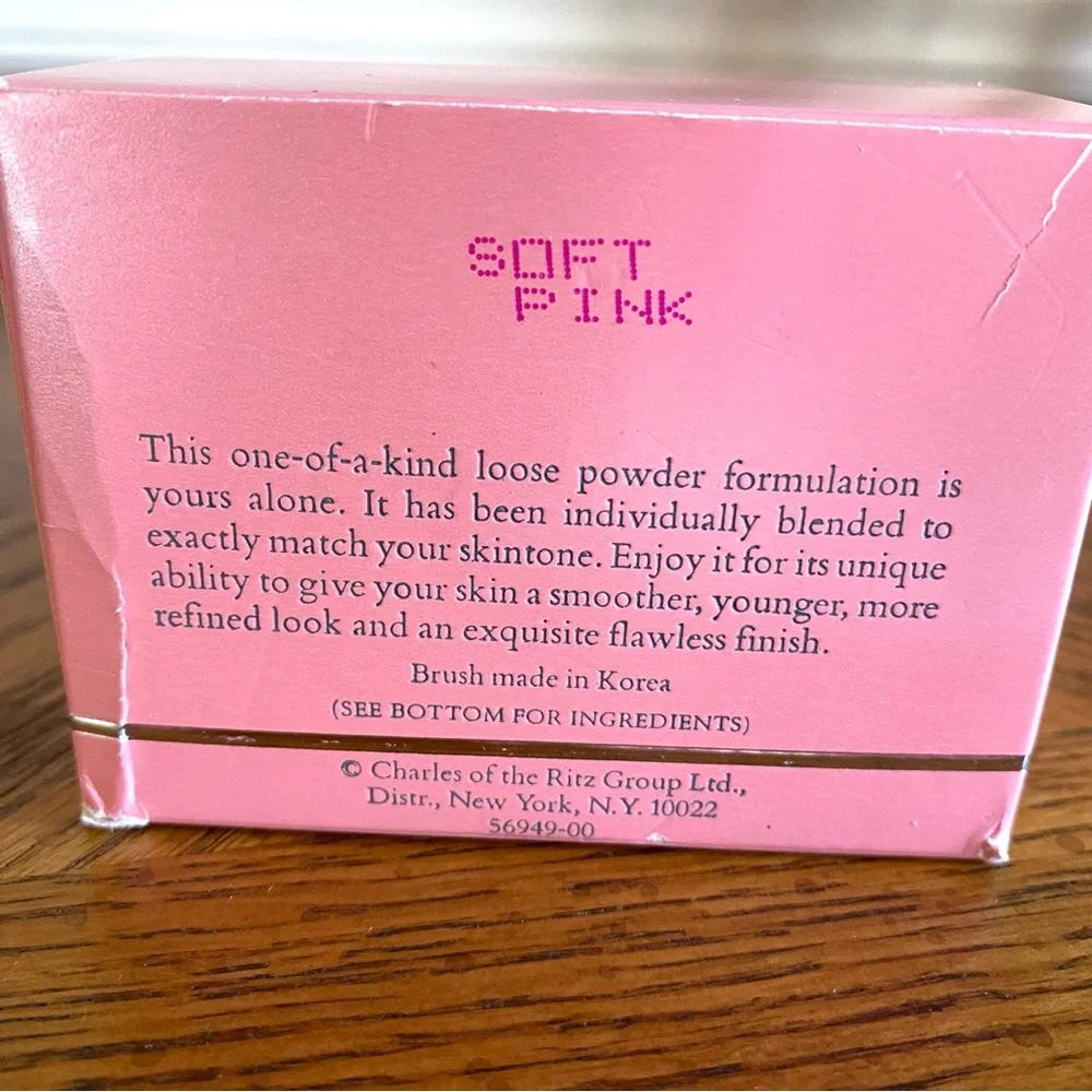 5/$25 Charles of the Ritz Loose Powder with Brush - Pink for a light brightner